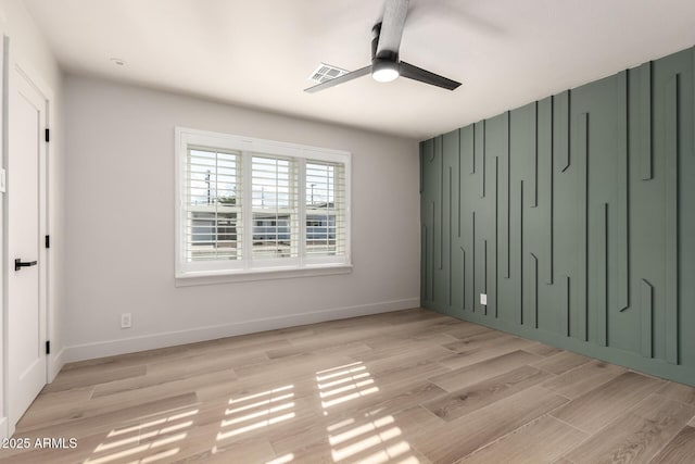 interior space featuring light hardwood / wood-style flooring and ceiling fan