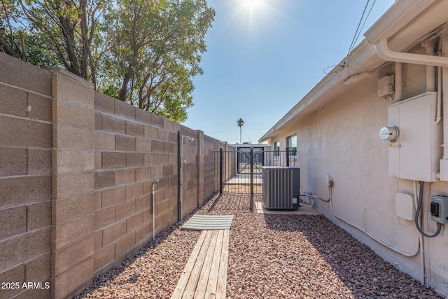 view of yard featuring central AC