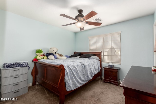 bedroom featuring ceiling fan and light carpet