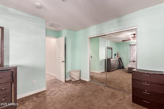 bedroom featuring carpet floors and a closet