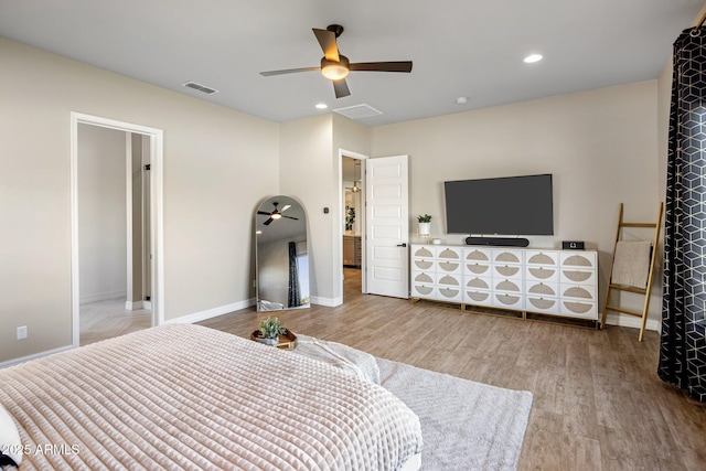 bedroom featuring ceiling fan and light hardwood / wood-style flooring