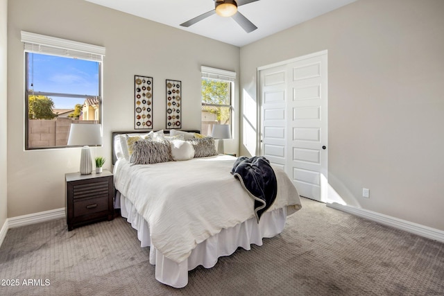 bedroom with carpet flooring, ceiling fan, and a closet