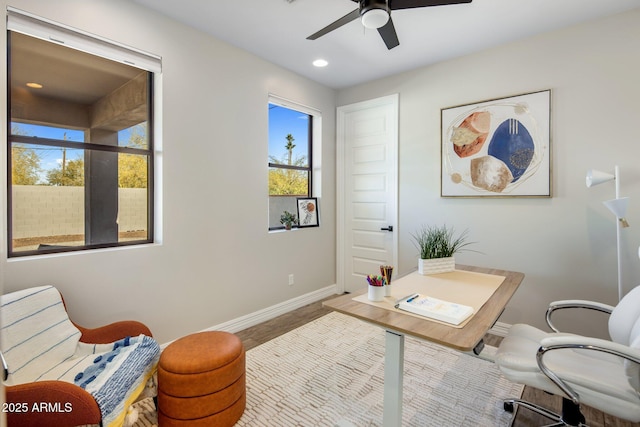 office area with ceiling fan