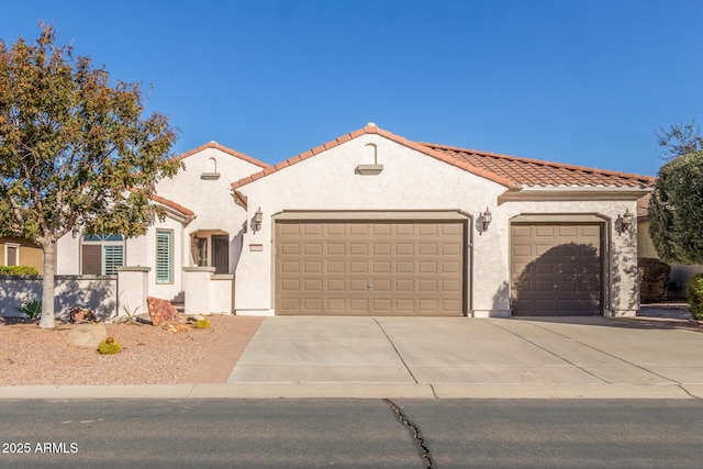 mediterranean / spanish-style house featuring a garage