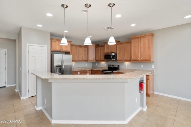 21532 N 262nd Ln, Buckeye, AZ 85396 - kitchen featuring appliances with stainless steel finishes, a kitchen island, light tile patterned flooring, recessed lighting, and baseboards