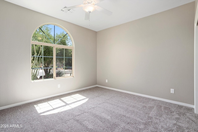 21532 N 262nd Ln, Buckeye, AZ 85396 - empty room featuring carpet flooring, ceiling fan, and baseboards