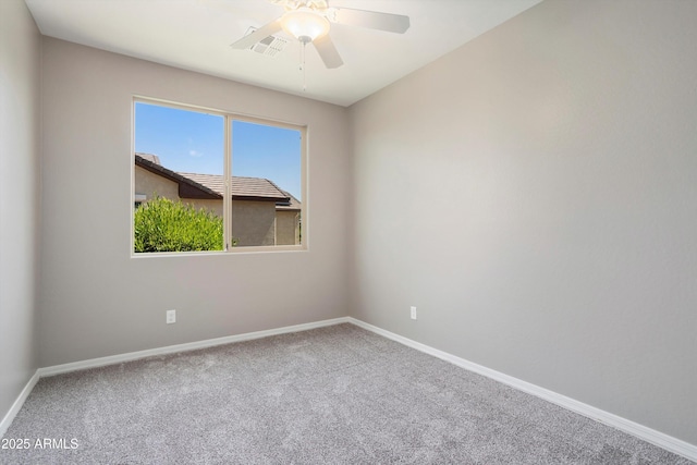 21532 N 262nd Ln, Buckeye, AZ 85396 - carpeted spare room with a ceiling fan and baseboards