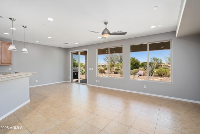 21532 N 262nd Ln, Buckeye, AZ 85396 - unfurnished living room with recessed lighting, ceiling fan, baseboards, and light tile patterned floors
