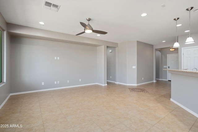 21532 N 262nd Ln, Buckeye, AZ 85396 - unfurnished room featuring a ceiling fan, recessed lighting, and baseboards