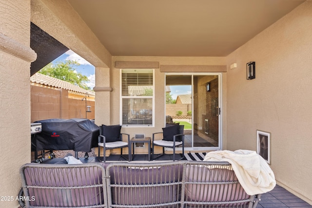 view of patio with fence and grilling area