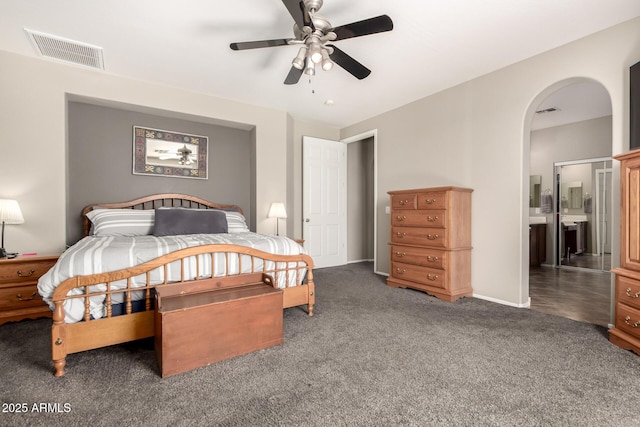 17005 S Coleman St, Phoenix, AZ 85045 - carpeted bedroom featuring arched walkways, ceiling fan, and visible vents