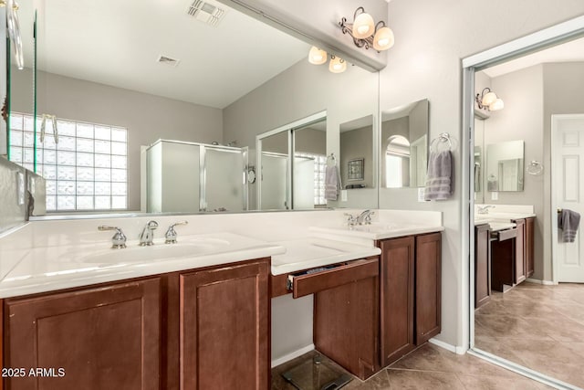 17005 S Coleman St, Phoenix, AZ 85045 - full bath with double vanity, a sink, a stall shower, and visible vents