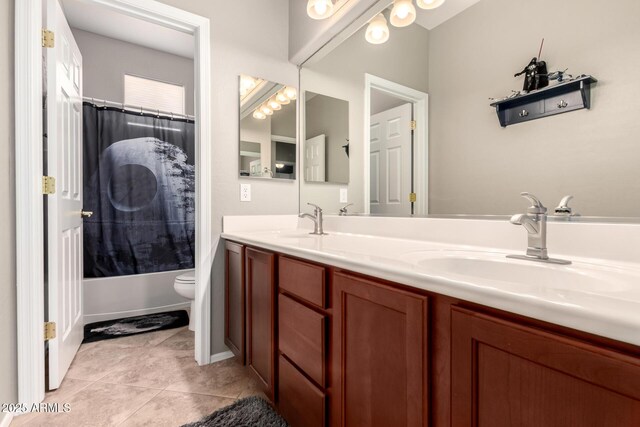 17005 S Coleman St, Phoenix, AZ 85045 - full bath with double vanity, toilet, a sink, and tile patterned floors