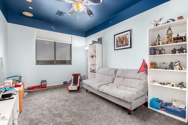 17005 S Coleman St, Phoenix, AZ 85045 - living area featuring carpet flooring, ceiling fan, and visible vents