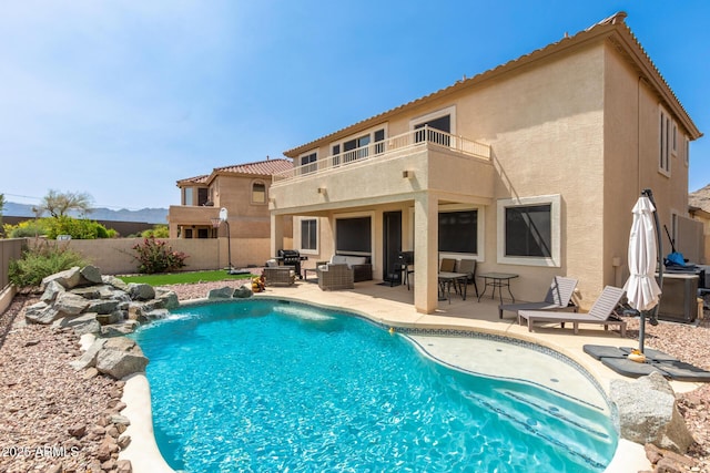 17005 S Coleman St, Phoenix, AZ 85045 - view of pool featuring a fenced backyard, a fenced in pool, an outdoor hangout area, and a patio