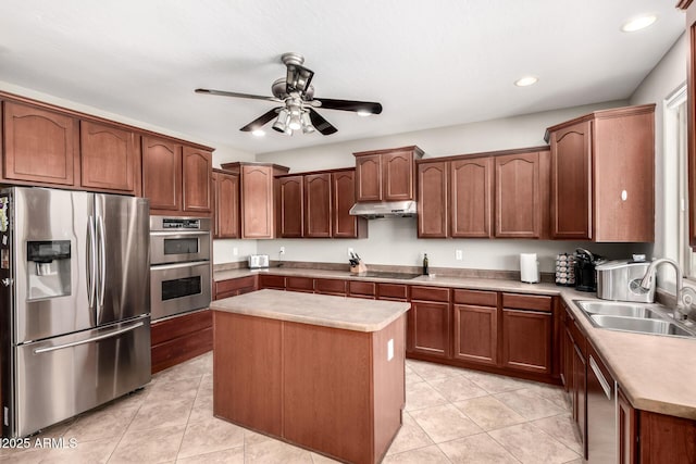 17005 S Coleman St, Phoenix, AZ 85045 - kitchen featuring light tile patterned flooring, ceiling fan, appliances with stainless steel finishes, under cabinet range hood, and a sink