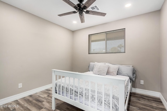 bedroom with visible vents, recessed lighting, baseboards, and wood finished floors