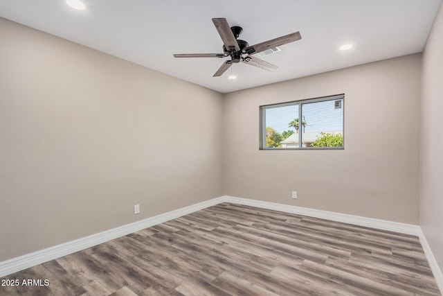 unfurnished room with recessed lighting, ceiling fan, baseboards, and wood finished floors