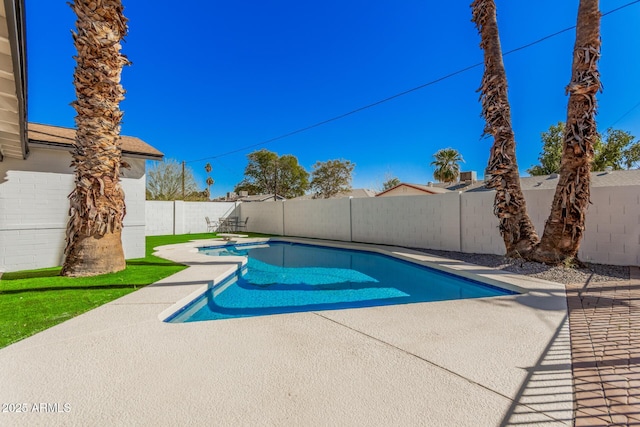 view of swimming pool with a diving board, a fenced backyard, a fenced in pool, and a patio area