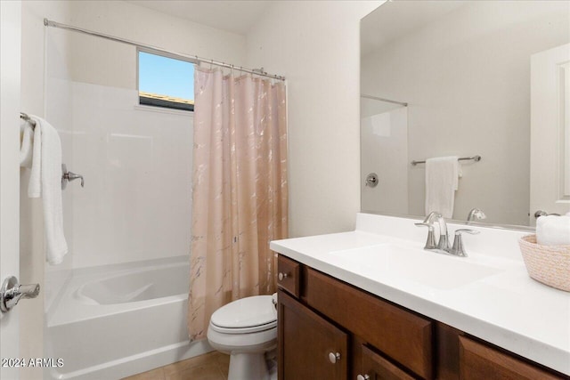 full bathroom featuring shower / bath combo with shower curtain, toilet, tile floors, and vanity