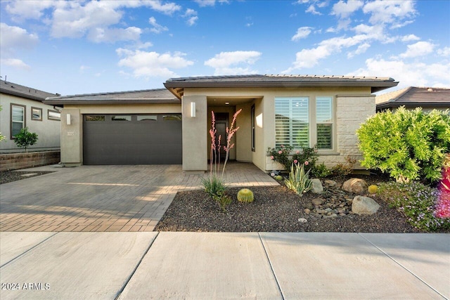 prairie-style house with a garage