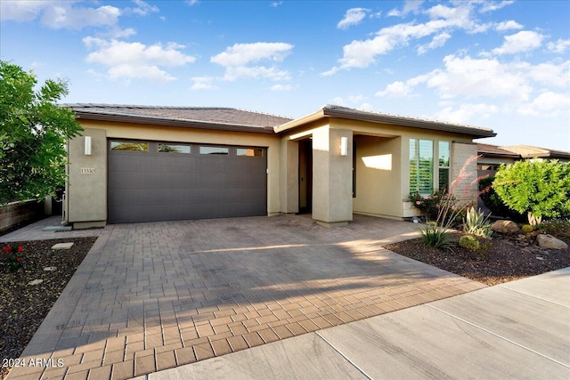 prairie-style home with a garage