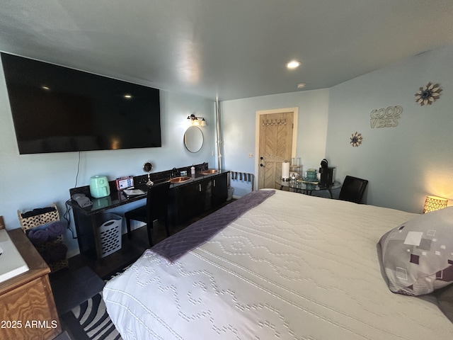 bedroom featuring recessed lighting