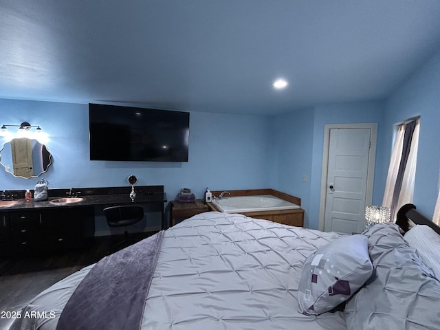 bedroom featuring a sink