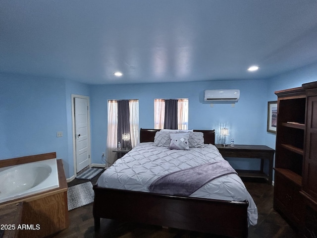 bedroom with recessed lighting, baseboards, and a wall mounted AC