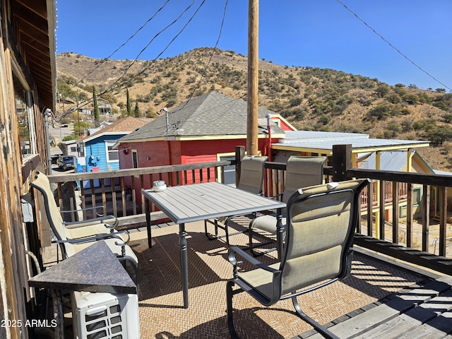 wooden terrace featuring a mountain view