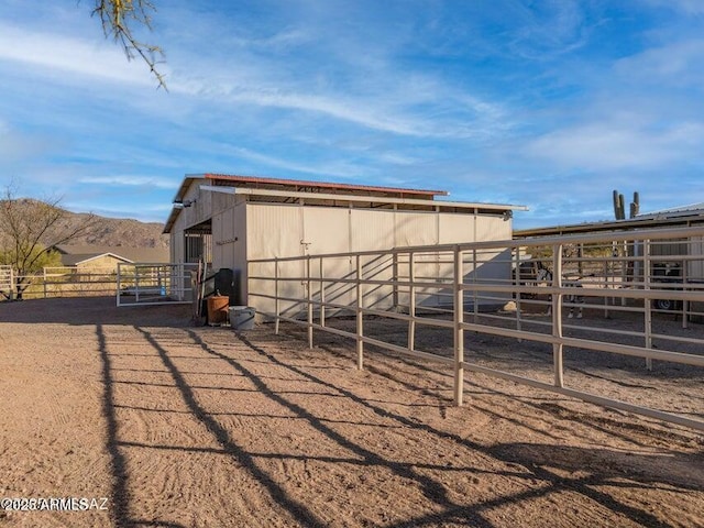 view of outbuilding with an exterior structure and an outbuilding