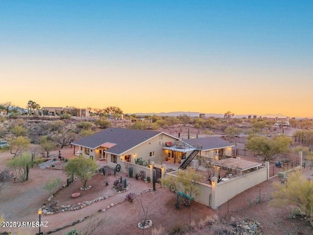 view of aerial view at dusk