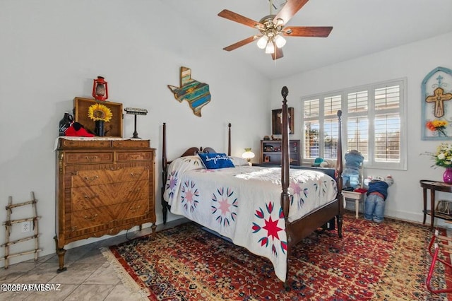 bedroom with lofted ceiling and ceiling fan