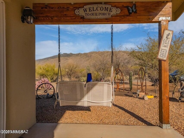 view of patio with a mountain view