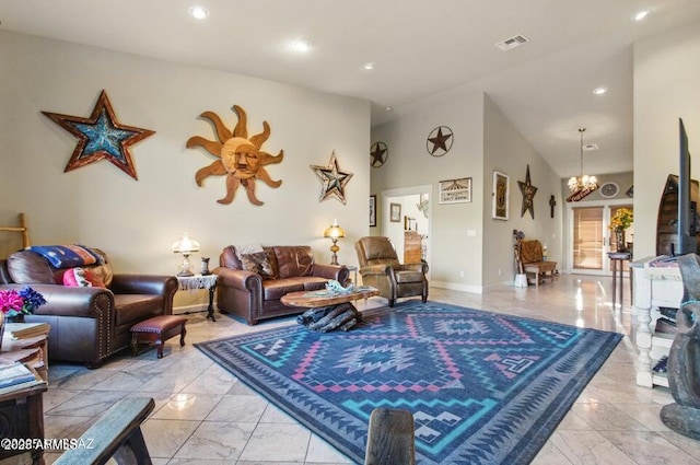 living area with visible vents, marble finish floor, recessed lighting, and a notable chandelier