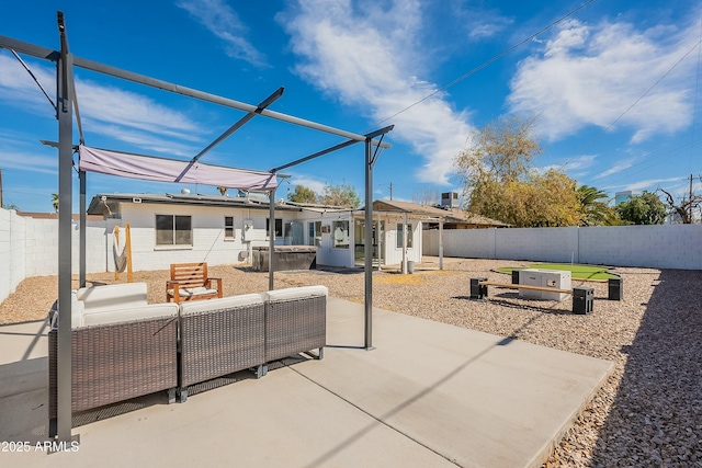 exterior space featuring a fenced backyard and outdoor lounge area