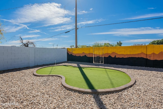 view of yard with a fenced backyard