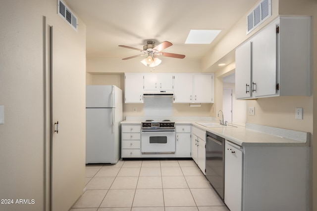 kitchen featuring ceiling fan, sink, white cabinets, light tile patterned floors, and white appliances