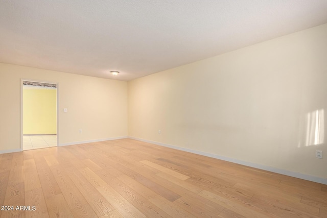 empty room featuring light hardwood / wood-style floors