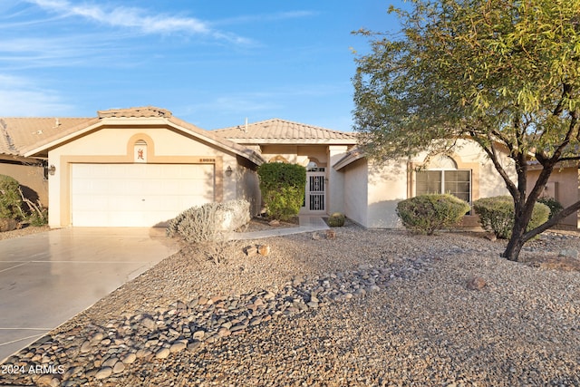 view of front of home with a garage