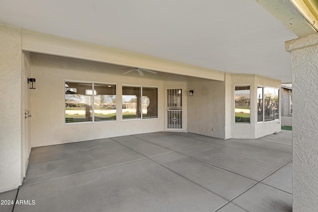 view of patio / terrace featuring ceiling fan