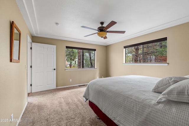 69 E Mohawk Dr, Flagstaff, AZ 86005 - carpeted bedroom with baseboards and a ceiling fan