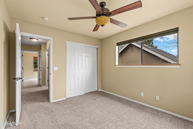 69 E Mohawk Dr, Flagstaff, AZ 86005 - unfurnished bedroom with carpet flooring, a closet, and baseboards