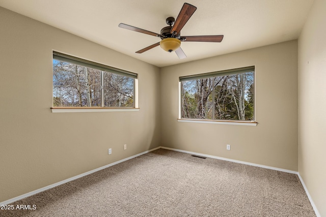 69 E Mohawk Dr, Flagstaff, AZ 86005 - unfurnished room featuring ceiling fan, carpet flooring, and baseboards