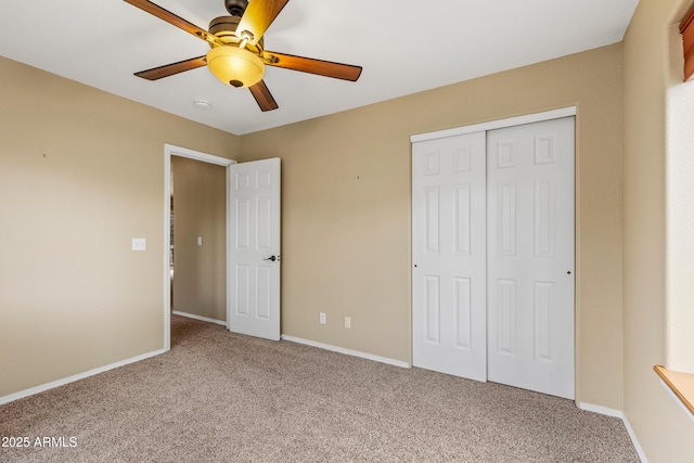 69 E Mohawk Dr, Flagstaff, AZ 86005 - unfurnished bedroom featuring carpet flooring, a closet, baseboards, and a ceiling fan