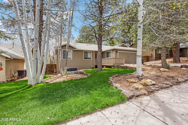69 E Mohawk Dr, Flagstaff, AZ 86005 - view of front facade with a front yard and a deck