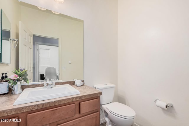 20261 W Desert Bloom St, Buckeye, AZ 85326 - bathroom featuring vanity and toilet