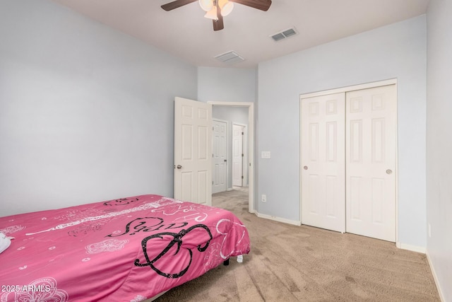 20261 W Desert Bloom St, Buckeye, AZ 85326 - bedroom featuring visible vents, carpet flooring, baseboards, and a closet