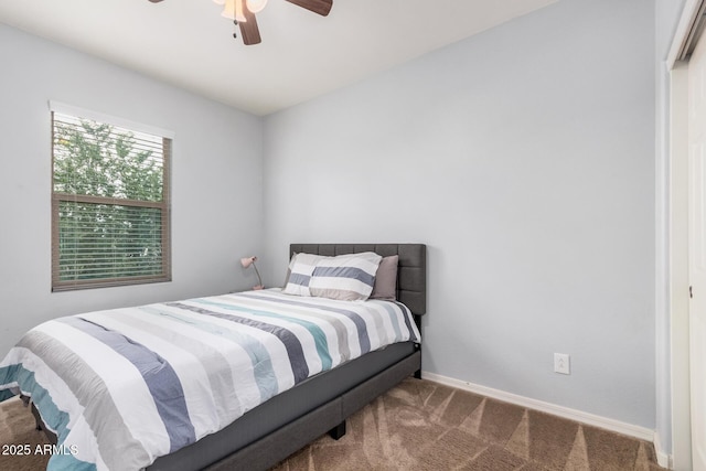 20261 W Desert Bloom St, Buckeye, AZ 85326 - bedroom with carpet flooring, baseboards, and ceiling fan
