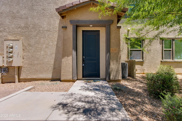 14870 W Encanto Blvd Unit 2006, Goodyear, AZ 85395 - doorway to property with stucco siding
